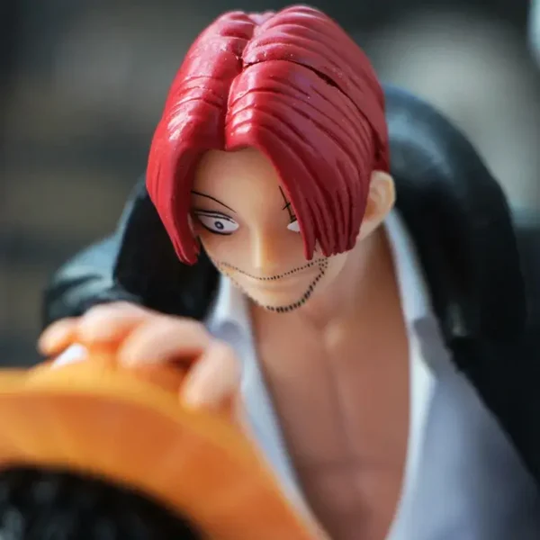figura de luffy y shanks