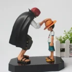 figura de luffy y shanks