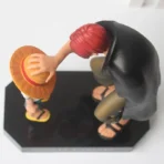 figura de luffy y shanks